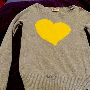 Grey crew net sweater great for girls 10-15 has a yellow heart in front